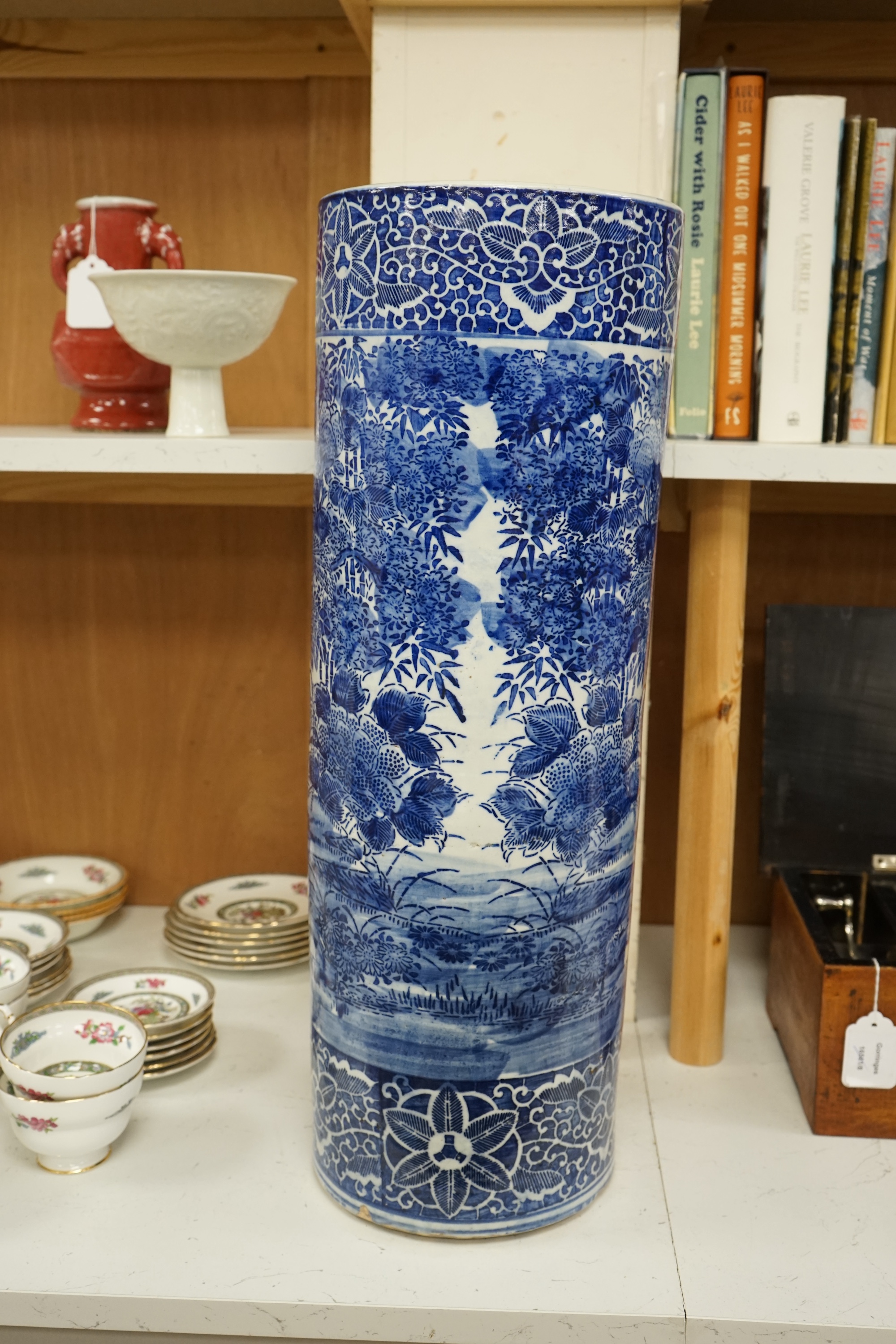 A Japanese blue and white stick stand, 60cm high., Condition - good